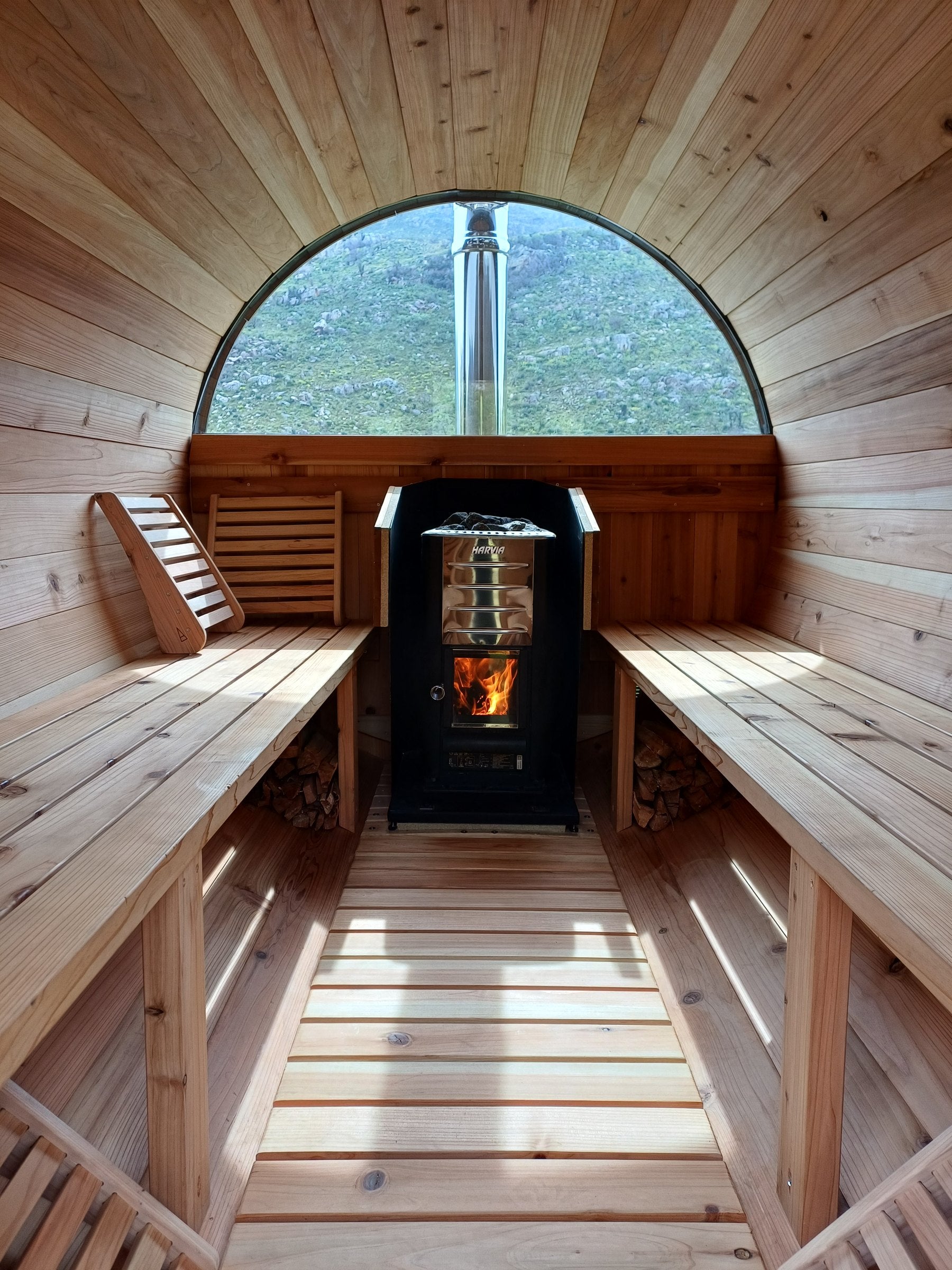 Evening at a BANYA sauna, fire pit lit