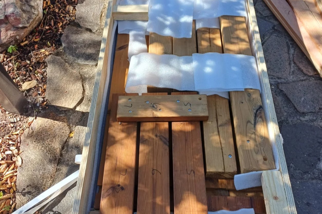 Shaping the timber frame of the barrel