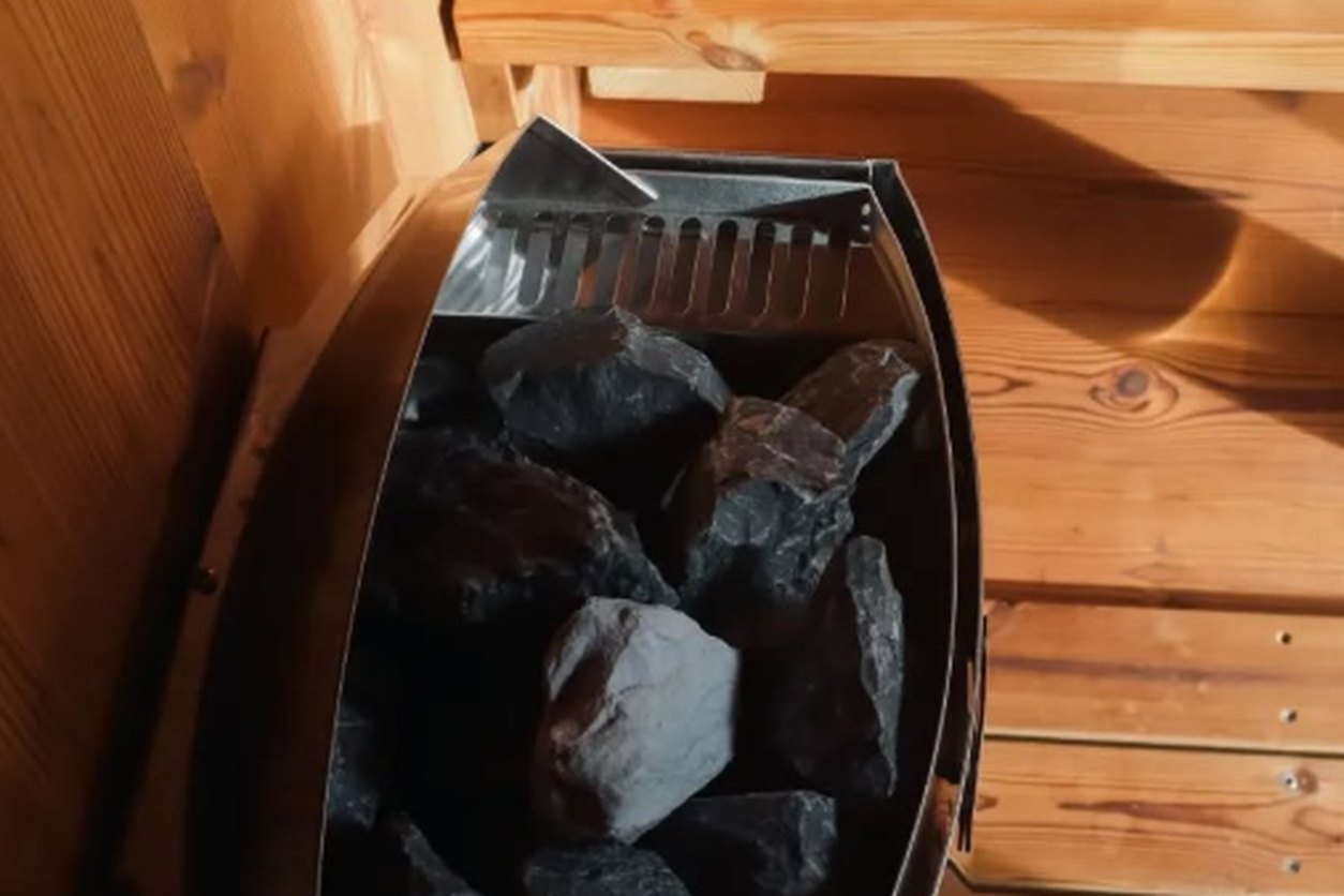 The Harvia heater, coals glowing