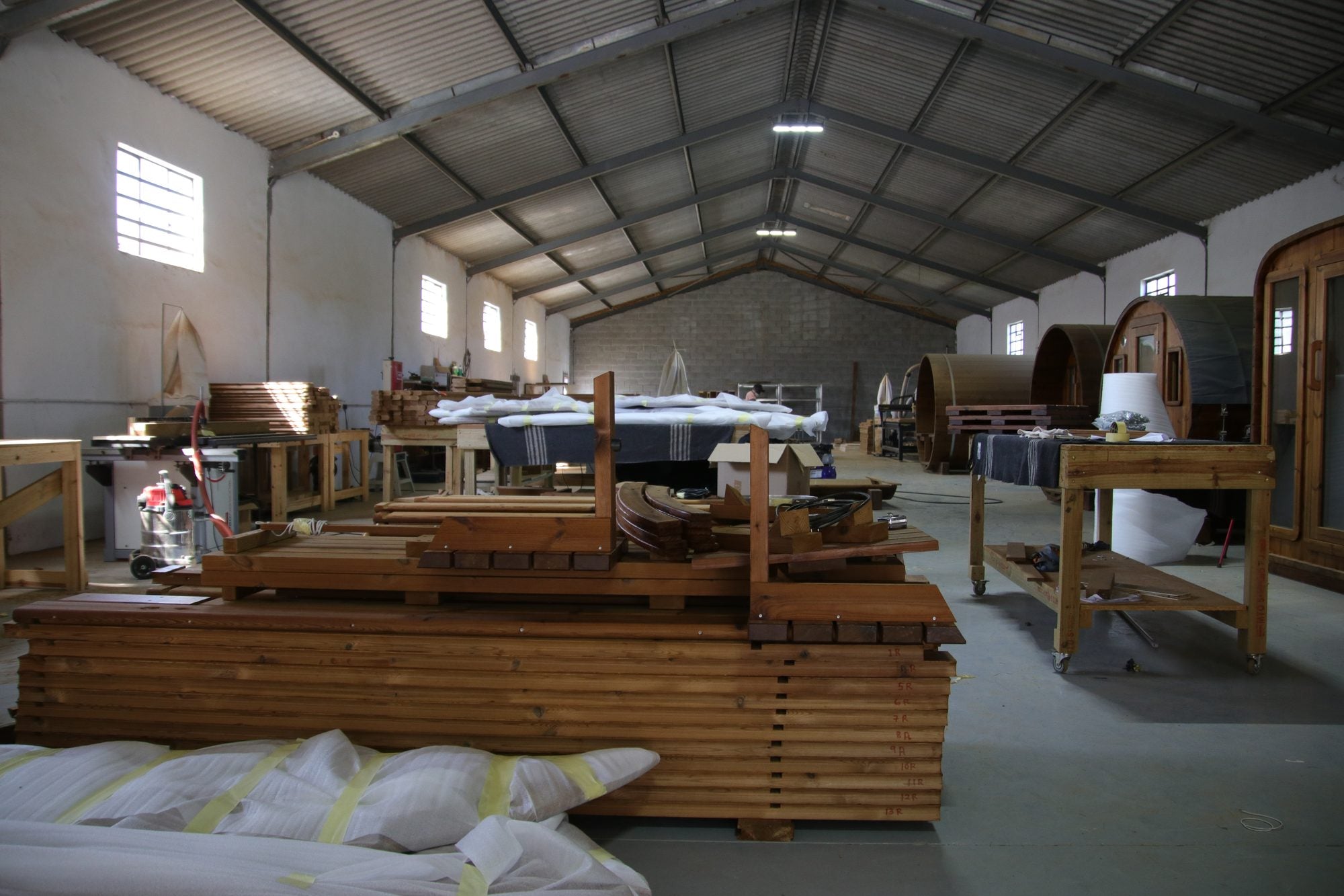 The workshop floor, saunas at every stage of build
