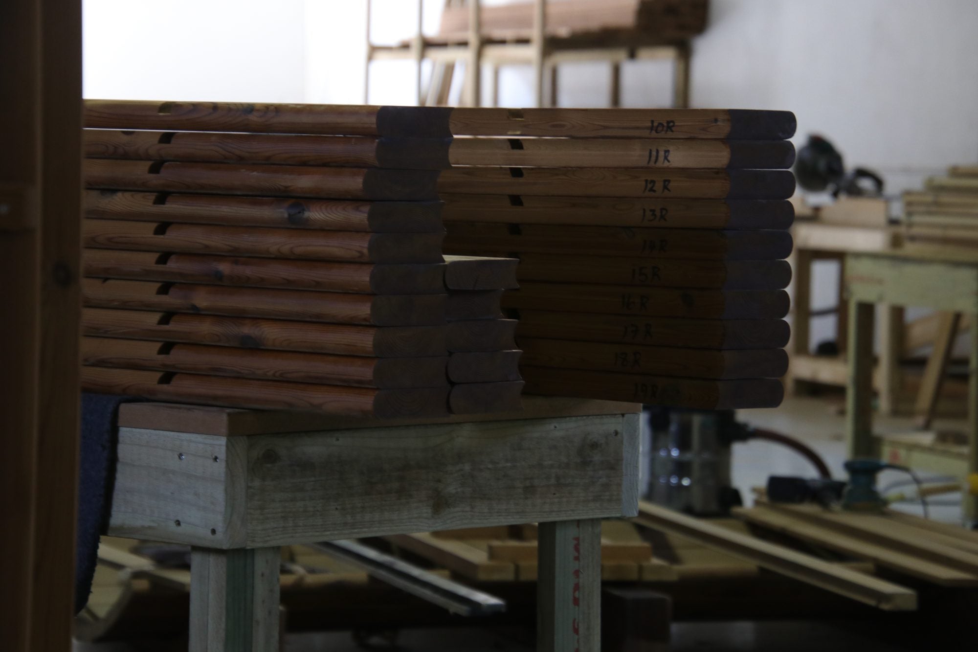 Machined staves stacked and waiting