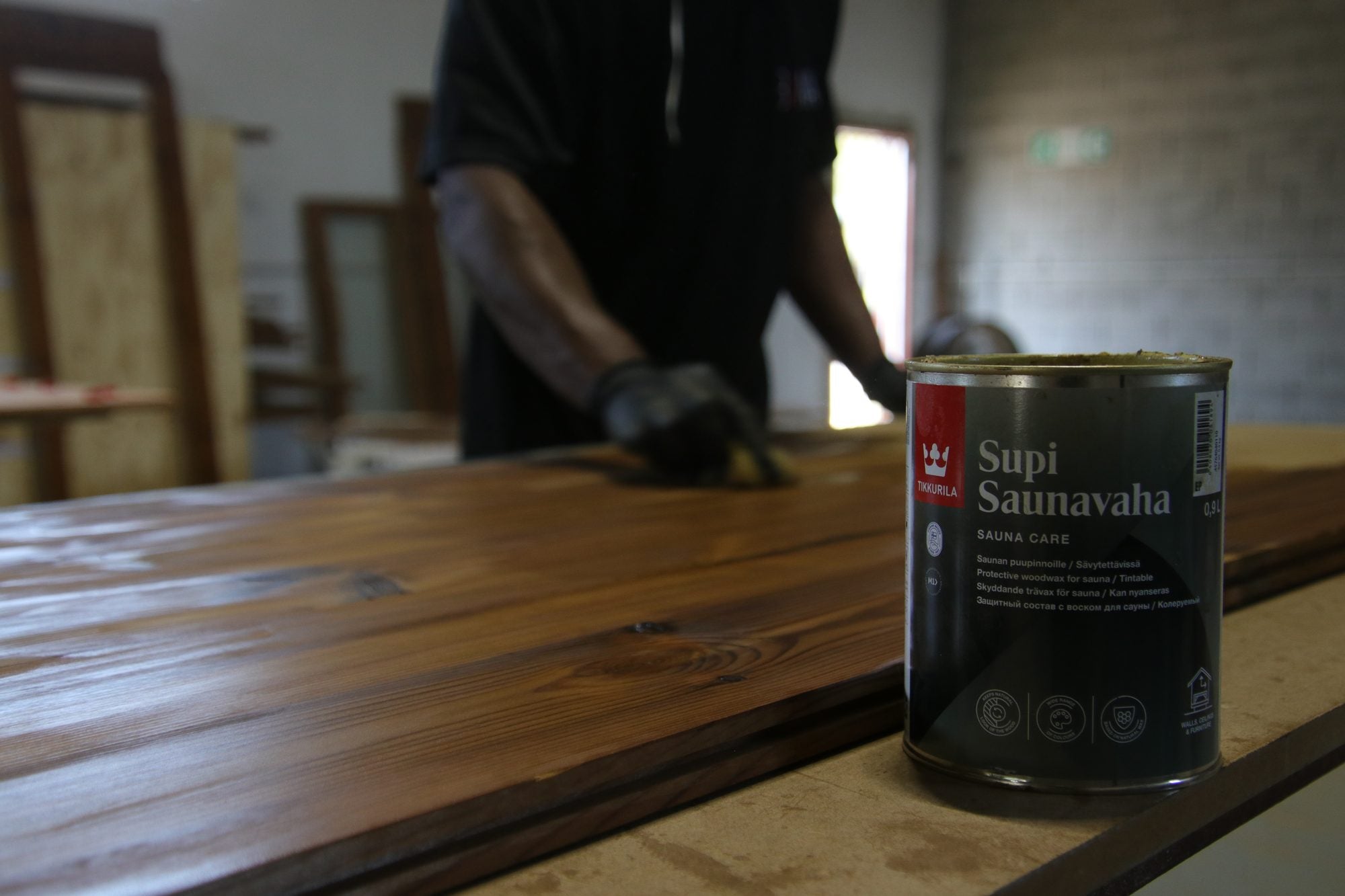 Brushing on the Supi Saunavaha finish